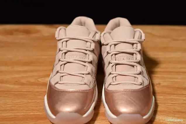 AH7860-105 11 Jordan Rose Gold Low Air GS 0613